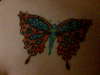 fairy/butterfly/pixie...actually not sure tattoo