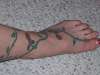 rose vine tattoo