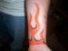 wrist flames tattoo