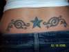 lower back stars tattoo