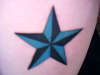 Blue and Black Star tattoo