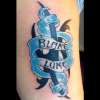 Tribal/banner tattoo