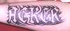 Lettering design (last name) tattoo