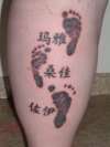 Baby feet tattoo