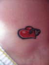 Pierced heart tattoo