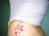 paper crane and flowers tattoo