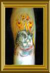 Dog portrait in flames tattoo