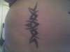 pink n black tribal tattoo