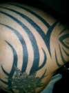 tribal shoulder piece tattoo