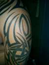 tribal arm piece tattoo