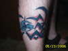 tribal leg tattoo