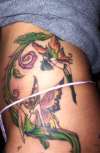 hip and upper left thigh tattoo