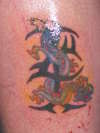 Tribal Dragon tattoo