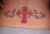 ankh, vines and stars tattoo