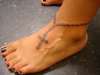 Rosary beads tattoo