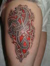 celtic thigh piece tattoo