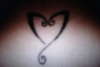evil heart tattoo