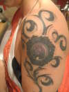 tribal flower tattoo