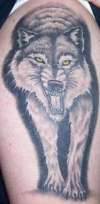 Prowling Wolf tattoo