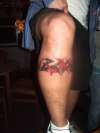 red and black tribal tattoo