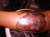 jesus peice/ not done yet tattoo