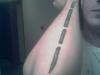 broken bones tattoo
