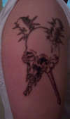 Damage Inc - Right Arm tattoo