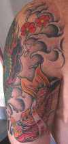 back of arm koi fish tattoo