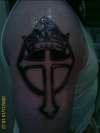 Cross with crown tattoo