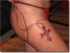 cross leg tattoo