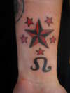 star and leo tattoo