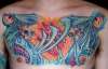 biomech chest tattoo