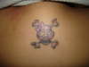 Pinky skull tattoo