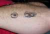 Lisa Eyes tattoo
