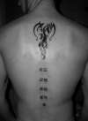 Dragon back tat tattoo