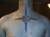 star on chest tattoo