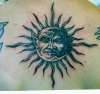 satan moon , sun god tattoo