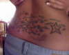 lower back tat tattoo