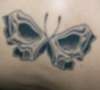 skull butterfly tattoo