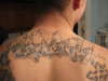 graffiti on back tattoo