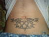Heartagram stomach tat tattoo