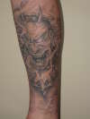 Black and White Japanese Mask tattoo