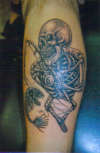 Skull fishing tattoo