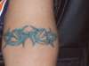 tribal arm tattoo