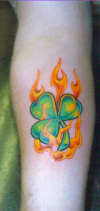 Flaming shamrock tattoo