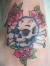 Skull & Crossbones with Pink Roses. tattoo