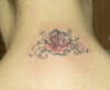 Flower tat on the back of my neck tattoo
