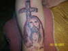 Jesus with cross tattoo