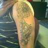left arm half sleeve in the works tattoo