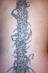 Bio mechanical spine tattoo